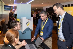 Intact Staff speak with clients