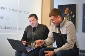 Grad and employee chatting 3
